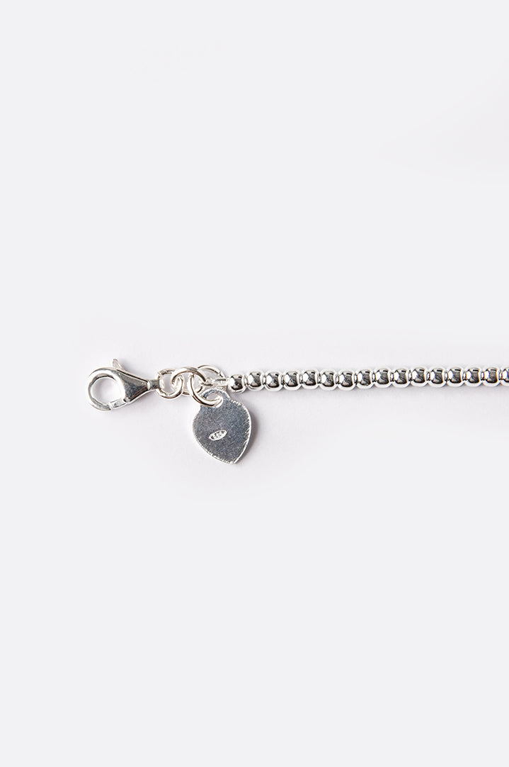 Silver bracelet with small beads and letter