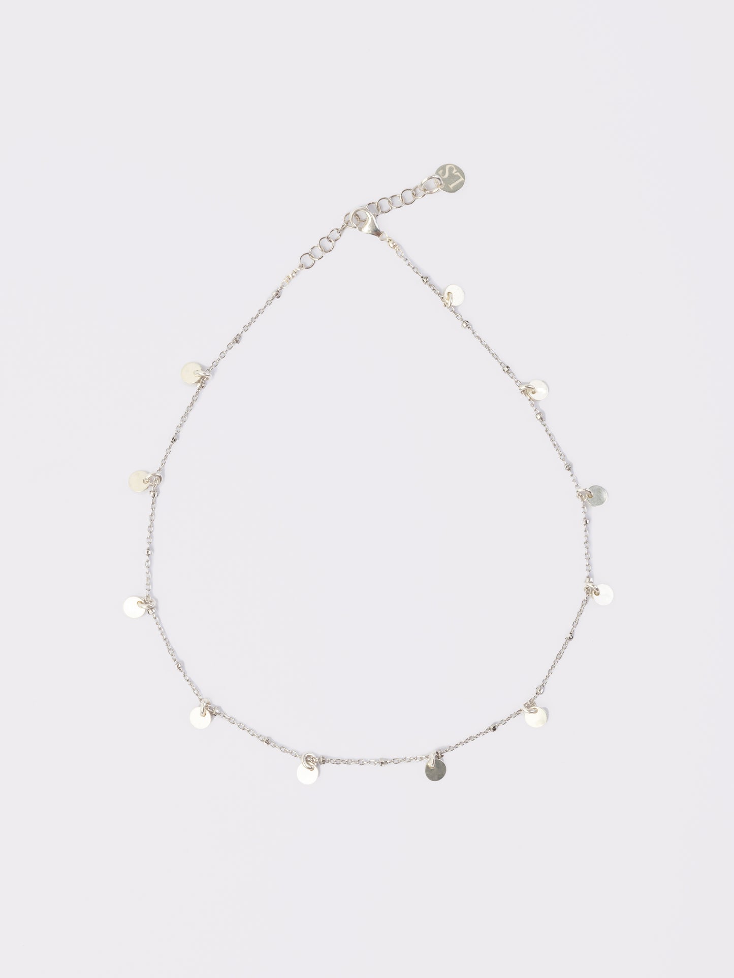 Silver anklet with charms