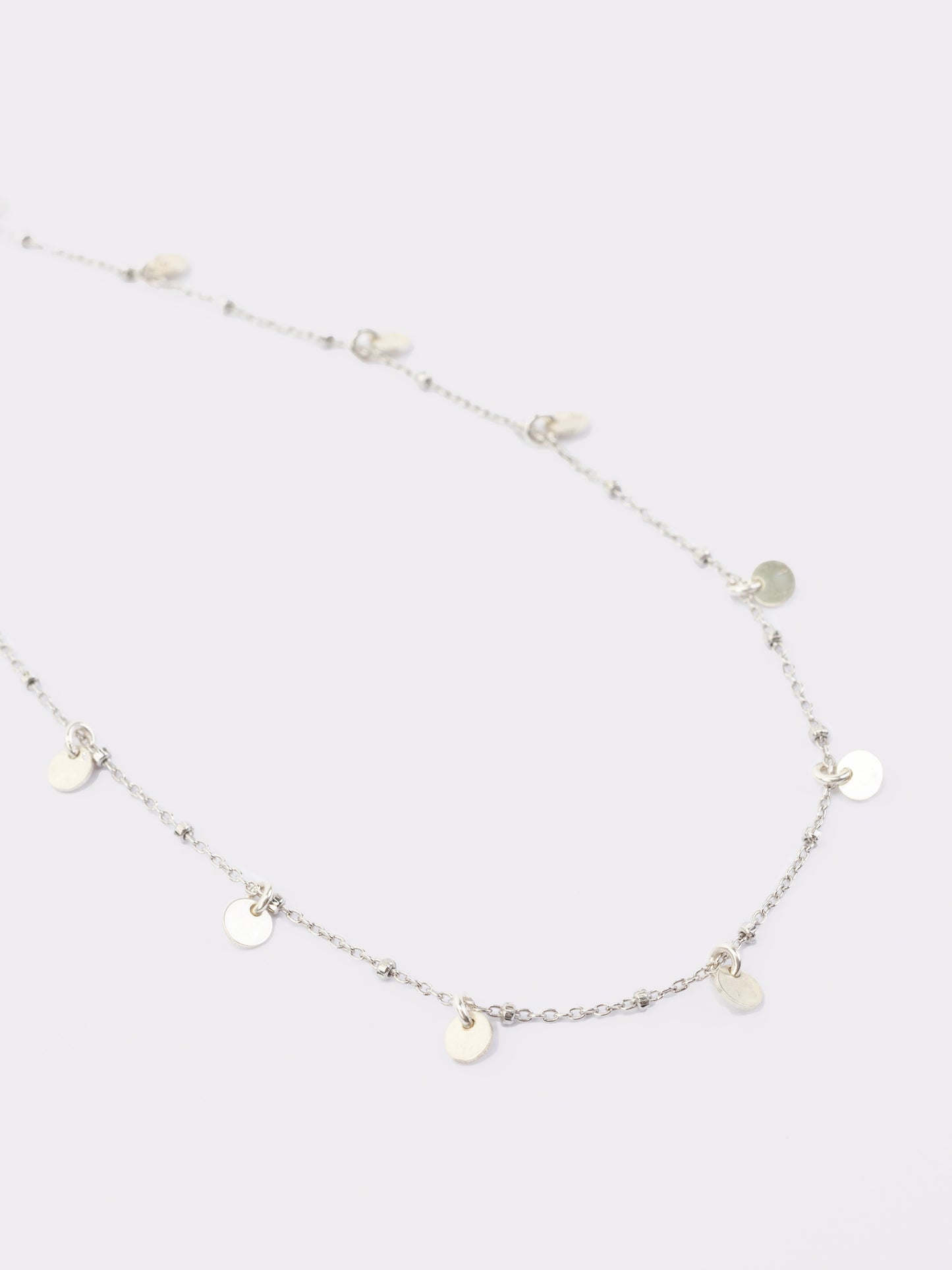 Silver anklet with charms