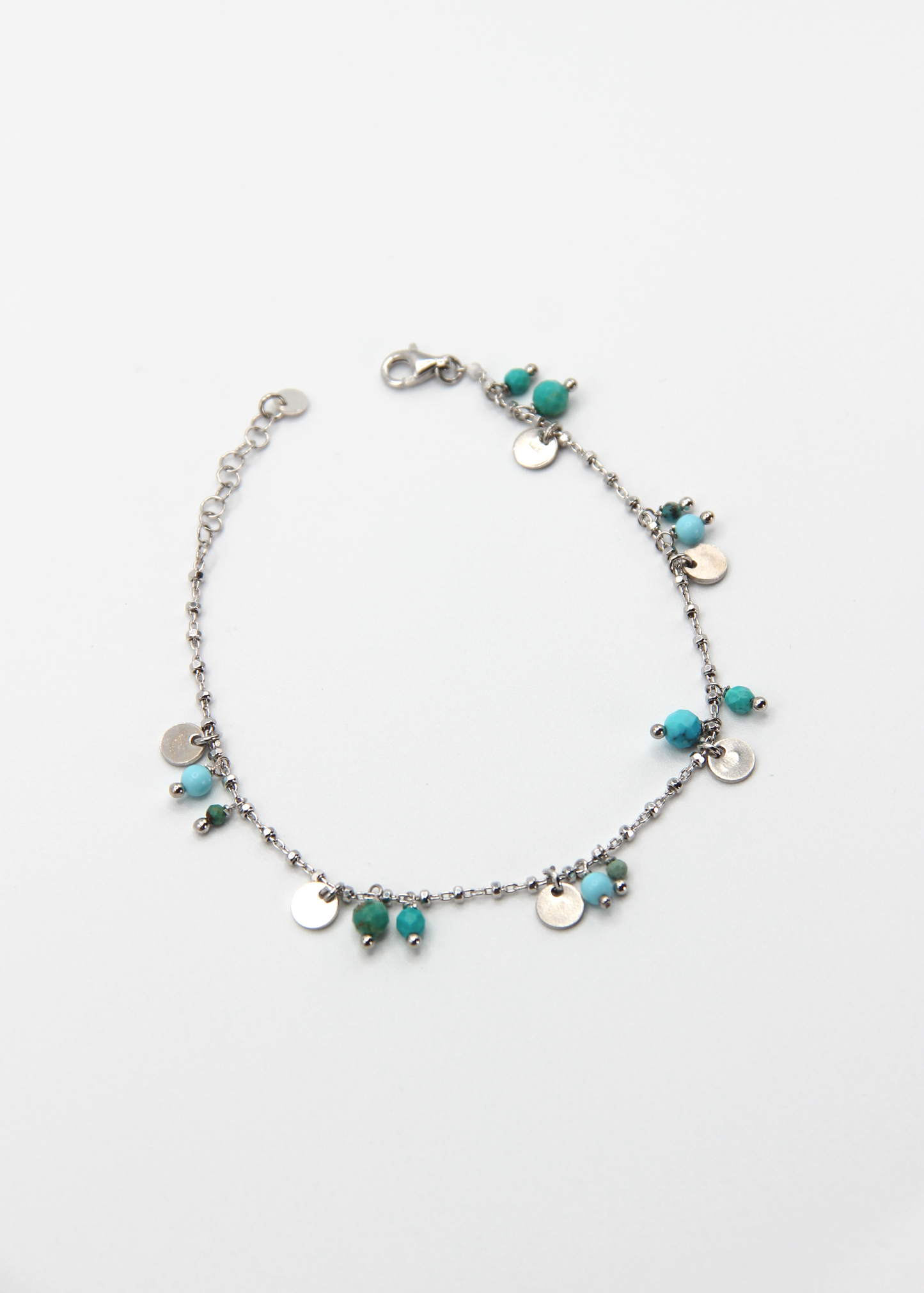 Bracciale Little Princess Summer Edition Laura Sciunnach in argento 925 con pietre di turchese e ciondoli rotondi. Bracciale estivo donna artigianale Made in Italy dal design elegante e luminoso.