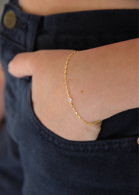 bracciale saldato in argento a genova, impreziosito con piccolo zircone centrale